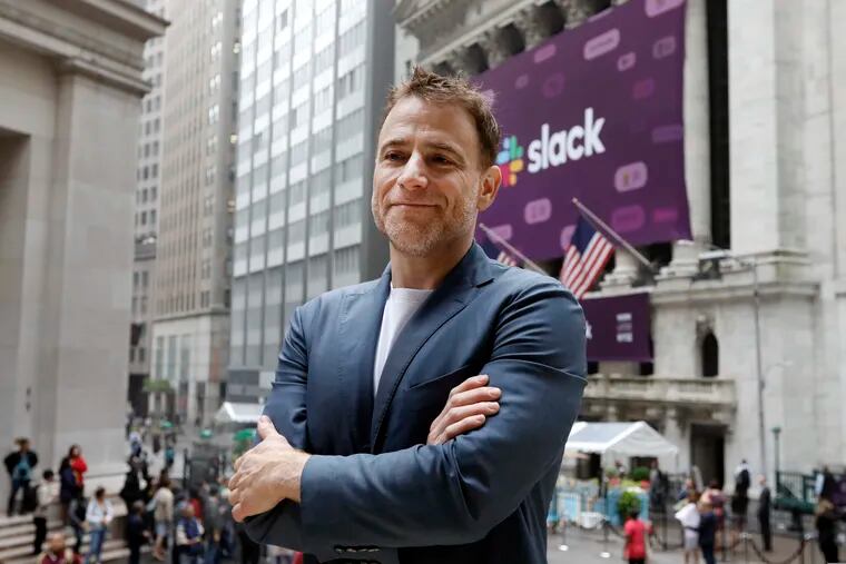 Slack CEO Stewart Butterfield poses for photos outside the New York Stock Exchange before his company's IPO, Thursday, June 20, 2019. (AP Photo/Richard Drew)