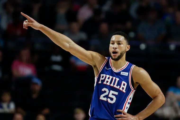 76ers guard Ben Simmons directs his team against the Charlotte Hornets on Friday.