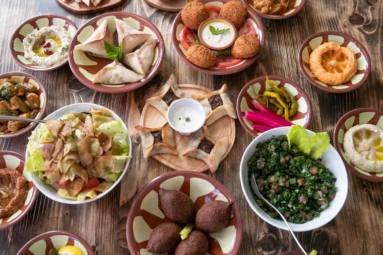Mezza dishes, both cold and hot, sit on a table at Li Beirut restaurant in Collingswood, NJ. Li Beirut is a new Lebanese restaurant on Collings Avenue.