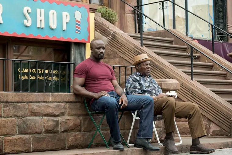 Mike Colter (left), Frankie Faison in &quot;Luke Cage.&quot;