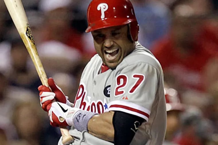 Placido Polanco left last Saturday's game against the Giants due to injury. (Jeff Roberson/AP file photo)