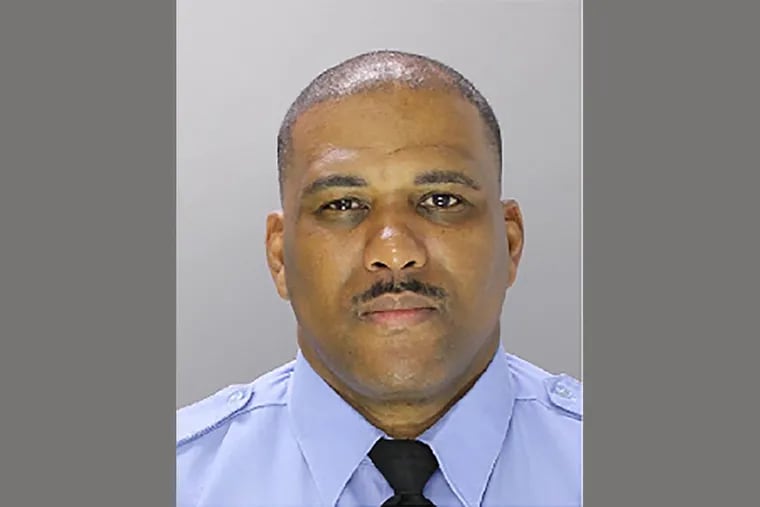 Philadelphia Police Officer William Watts Sr. was arrested Thursday after FBI agents raided his Philadelphia home. He is charged with possessing and transmitting over the internet images of children being sexually abused.