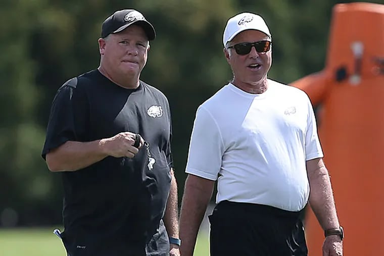 Eagles head coach Chip Kelly (left) owner Jeffrey Lurie.