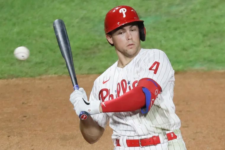 Phillies second baseman Scott Kingery leans back from a high, inside pitch in the eighth inning last Saturday night.