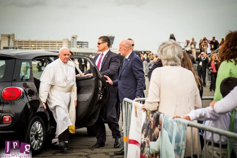 Pope Francis gets out of the FIAT 500L in Philadelphia in 2015.
