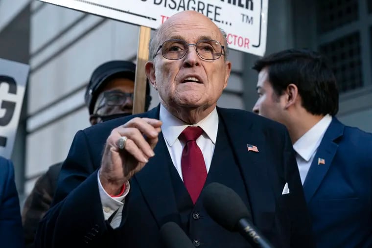 Former Mayor of New York Rudy Giuliani speaks during a news conference outside the federal courthouse in Washington, Dec. 15, 2023. Guiliani, a lawyer for former President Donald Trump, was among those indicted Wednesday, April 24, 2024, in an Arizona election interference case.