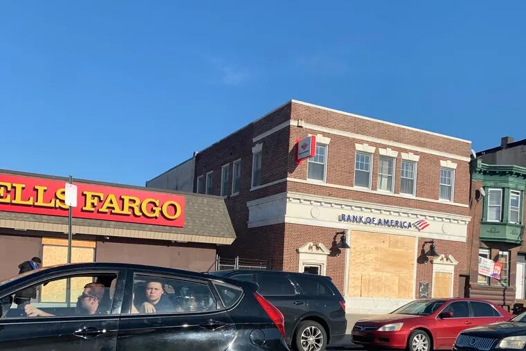 The boarded up Wells Fargo and Bank of America branches on East Allegheny Avenue in Philadelphia's Port Richmond section earlier this month.