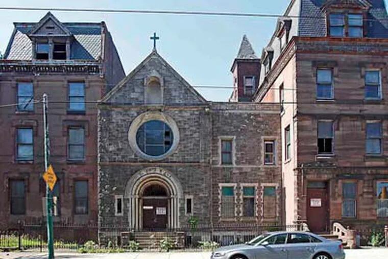 The three-building property at Girard Avenue and Corinthian Street consists of a chapel flanked by former housing for nuns. (Akira Suwa / Staff Photographer)