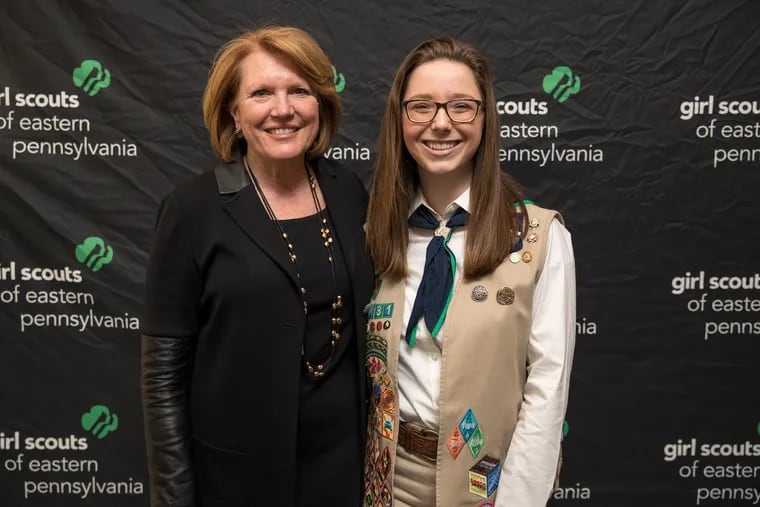 Madeline Bell, CEO and President of CHOP, and Girl Scout Molly H. at the 2019 Take the Lead Greater Philadelphia ceremony.