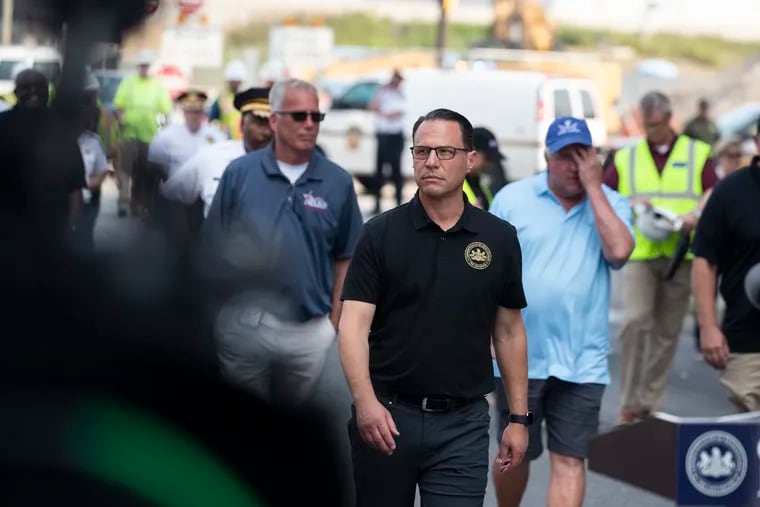 Gov. Josh Shapiro arrives for a press conference with other officials near the collapsed section of I-95 in Philadelphia on Sunday.