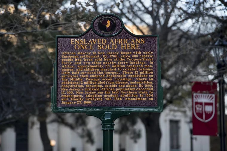 A historical marker installed at the southeast corner of Front and Cooper Streets, in front of the Walt Whitman Cultural Center. The marker, recalling the forcible transportation of African slaves to Camden in the 18th century, was unveiled at the Camden County Historical Society’s Ancestral Remembrance Ceremony on Monday.