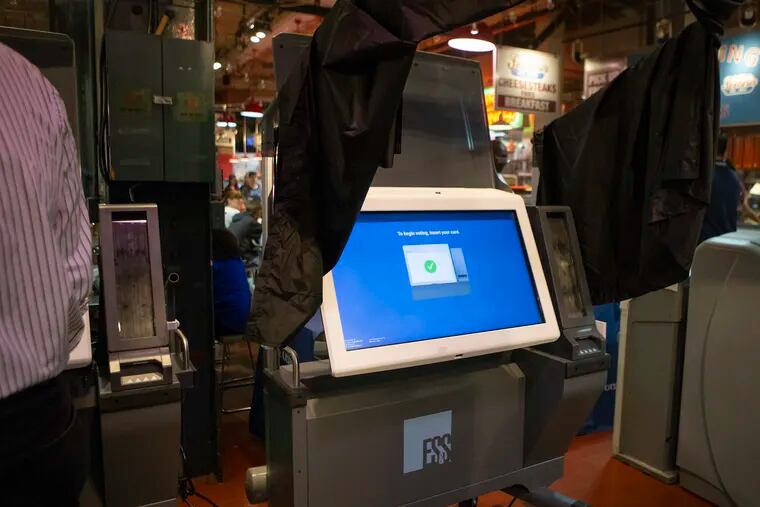 New voting machines sit in the Center Court at Reading Terminal Market for the public to test out and demonstrate for the first time on Friday, June 07, 2019.