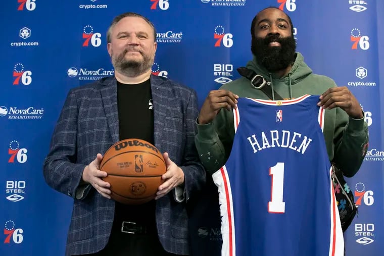 James Harden poses with Daryl Morey following Harden's introductory press conference in 2022. Less than two years later, Harden is off to Los Angeles.