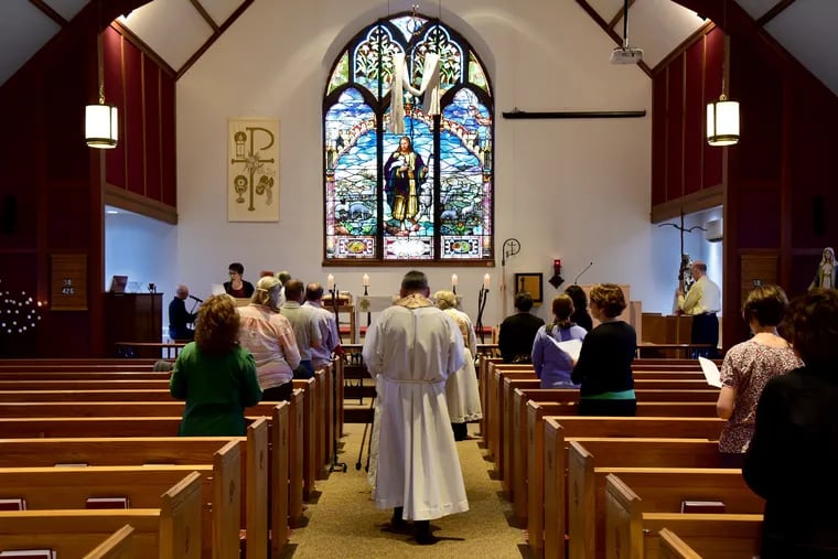 Saint Miriam Parish and visiting clergy walk in procession into the sanctuary for a traditional Holy Thursday service April 18, 2019. St. Miriam’s is an independent (non-Vatican affiliated) Catholic church in Flourtown.