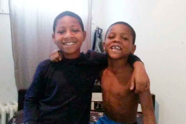 Undated photo from family of Zaron Henderson (left) with his brother Zamar Jones. Zamar Jones, 7, was shot in the head by a stray bullet, as he ducked to get out of the way, while on his front porch in the 200 block of N. Simpson St. on Saturday.