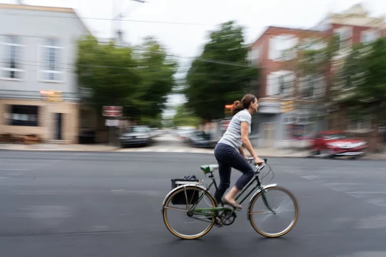 A biker on her morning commute down 11th street in South Philadelphia on Wednesday morning.