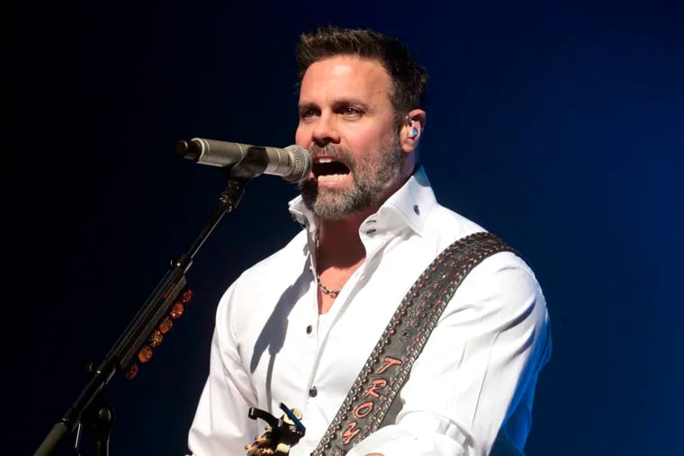In this Jan. 17, 2013 file photo, Troy Gentry of the Country Music duo Montgomery Gentry performs on the Rebels On The Run Tour in Lancaster, Pa. Federal investigators say pilot error following engine maintenance problems caused a helicopter crash last year that killed Gentry and the pilot in New Jersey. The September 2017 crash occurred during a pleasure flight for Gentry at the Flying W Airport in Medford, where he was to perform that night at the airport’s resort.