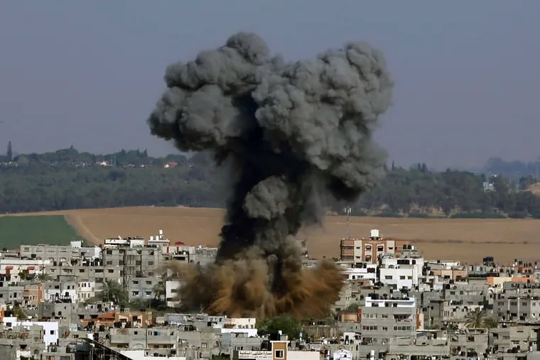 Smoke rises after an Israeli airstrike Tuesday in Gaza City.