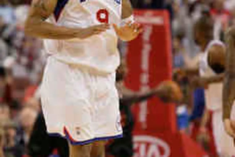 The 76ers' Andre Iguodala reacts after his three-pointer againt the Heat tied the game at 105 with 20.8 seconds remaining. His heave at the buzzer was not as accurate.