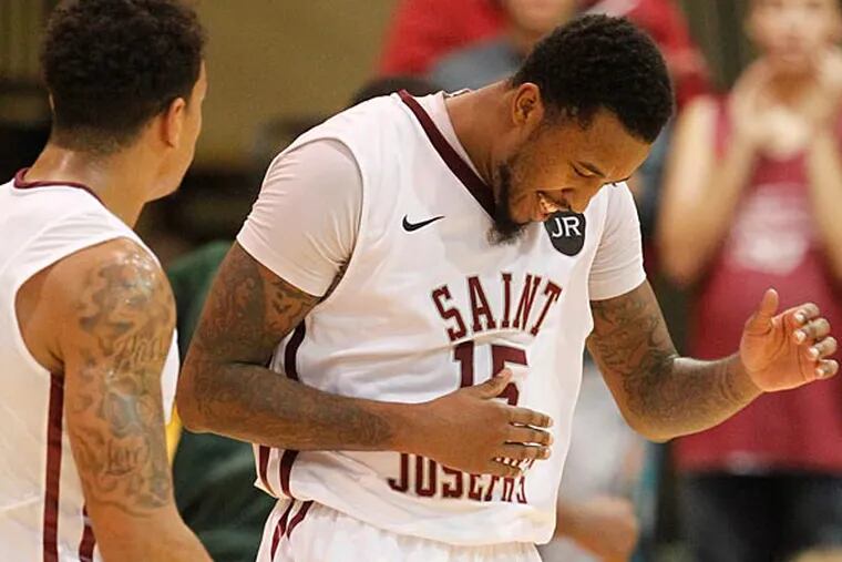 St. Joe's Isaiah is all smiles after hitting a three. (Ron Cortes/Staff Photographer)