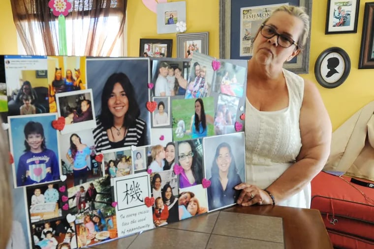 Jayne Grickis is shown with a collage of images of her daughter Jessica Ney at her Bernville, PA home Tuesday June 12, 2018.
