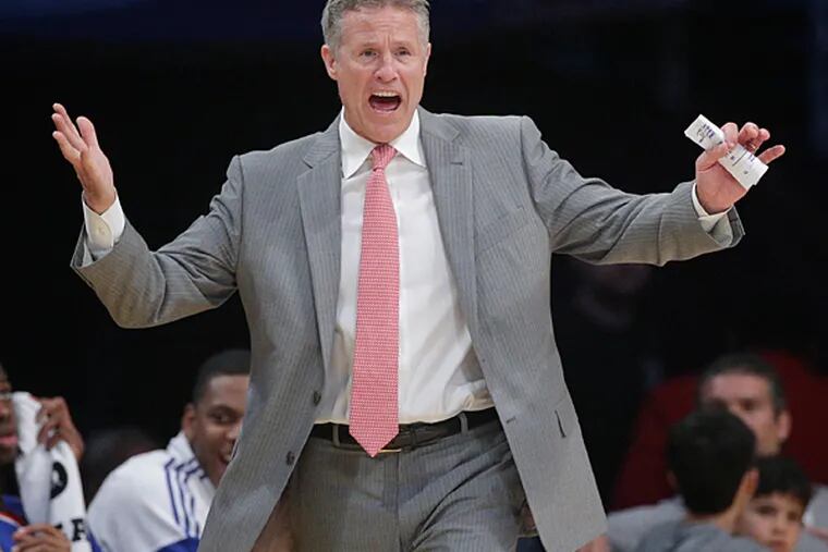 Philadelphia 76ers head coach Brett Brown directs his team during the
first half of an NBA basketball game against the Los Angeles Lakers,
Sunday, March 22, 2015, in Los Angeles. (Jae C. Hong/AP)