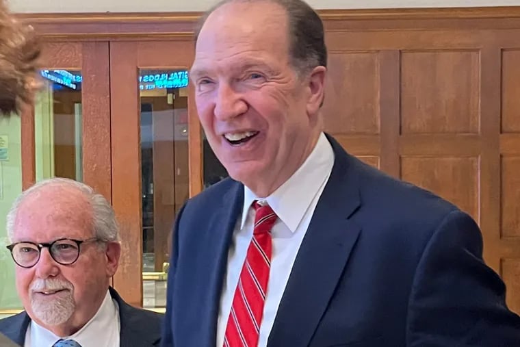 David Malpass (right), former president of the World Bank, with Joseph DiAngelo, dean of St. Joseph University's Haub School of Business, at a reception at the school's Mandeville Hall just before Malpass spoke in a presentation sponsored by the World Affairs Council of Philadelphia on Tuesday.