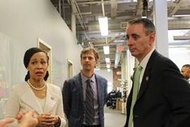 U.S. Rep. Lisa Blunt Rochester; Evan Malone, president of NextFab; and U.S. Rep. Brian Fitzpatrick at NextFab's main South Philly location last fall.