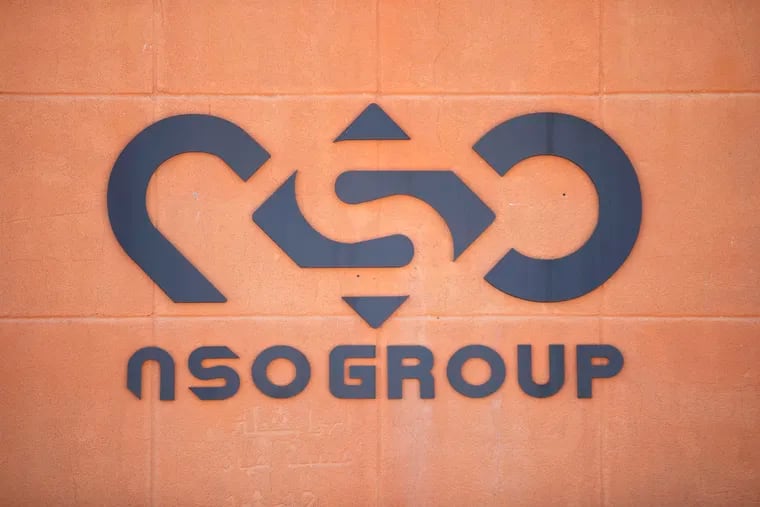 A logo adorns a wall on a branch of the Israeli NSO Group company, near the southern Israeli town of Sapir on Aug. 24, 2021. The Biden administration announced Wednesday, Nov. 3, that it is putting new export limits on two Israeli hacker-for-hire companies — including the well-known spyware company NSO Group — saying their tools have been used to "conduct transnational repression.”