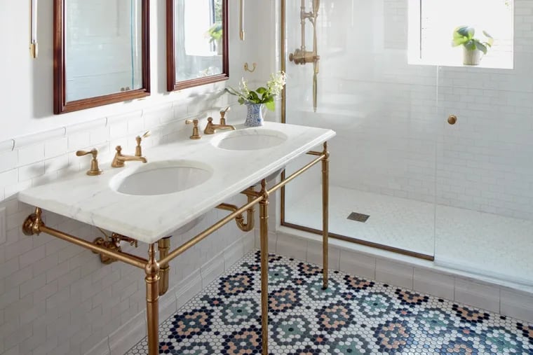 The intricate tile pattern for this master bath was created by senior designer Chelsie Lee of Jessica Helgerson Interior Design.