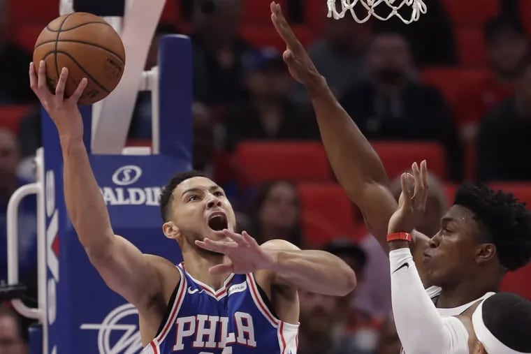 Sixers guard Ben Simmons (left) shoots as Detroit Pistons forward Stanley Johnson defends during the first half of the Sixers’ win.