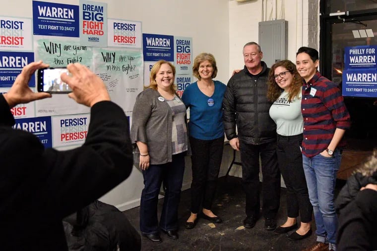 Mayor Kenney poses with members of Sen. Elizabeth Warren's field office staff during the opening in West Philadelphia Thursday. With him from left are: volunteer Beth Finn; Elizabeth Vale, a college classmate and senior adviser to Warren; Rachel Tait, PA campaign Mobilization Hub Manager; and Anne Wakabayashi, Warren's newly hired Pennsylvania state director.