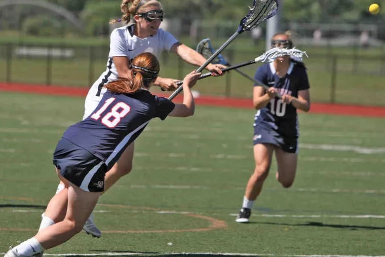 Moorestown junior Stephanie Toy, who has committed to Notre Dame, scores past Mendham's Sarah Gillespie to put the Quakers up by 5-0 early in the championship game.