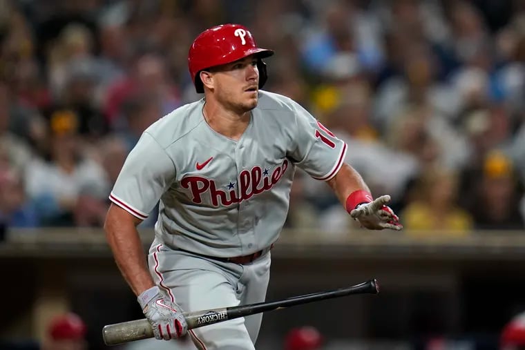 Philadelphia Phillies' J.T. Realmuto watches his three-run home run during the sixth inning of the team's baseball game against the San Diego Padres, Thursday, June 23, 2022, in San Diego. (AP Photo/Gregory Bull)