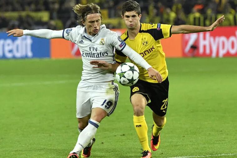 Hershey native Christian Pulisic (right) and Borussia Dortmund will face Real Madrid in the group stage of the UEFA Champions League for the second consecutive season.