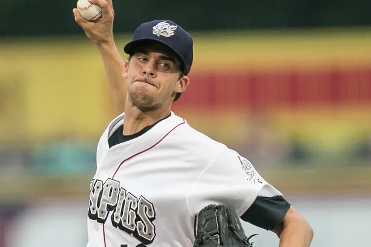 Aaron Nola delivers a pitch in his debut for the Triple A IronPigs. (Steven M. Falk / Staff Photographer)