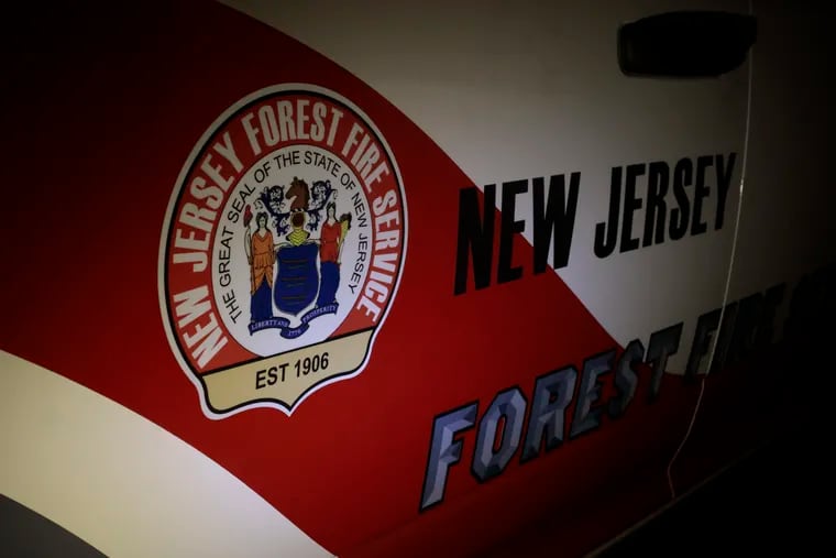 Officials from the New Jersey Forest Fire Service urged residents to avoid the area where a wildfire was burning Sunday in Lacey Township.