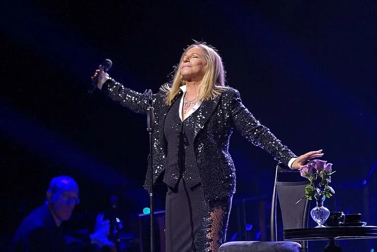 Barbra Streisand performing in 2012 at the Wells Fargo Center. A career montage in her new tour reminds fans of the many personas she has explored.
