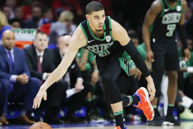 Celtics forward Jayson Tatum dribbles during the Sixers’ Game 3 loss on Monday.