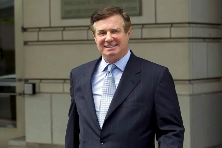 FILE - In this May 23, 2018, file photo, Paul Manafort, President Donald Trump's former campaign chairman, leaves the Federal District Court after a hearing in Washington. Federal prosecutors have charged banker Stephen M. Calk with trying to buy himself a role in President Donald Trump's administration by making risky loans to Manafort. Calk was arrested Thursday, May 23, 2019, in New York City on a financial institution bribery charge.