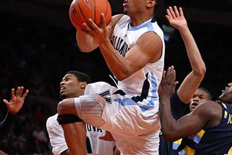 Corey Fisher and Villanova lost to Marquette in the Big East tourney. (Ron Cortes / Staff Photographer)