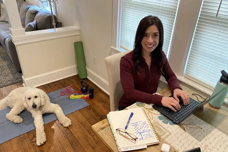 Kimberly Sargent DellaFranco and  JoJo in Kim's dining room/office/home gym.