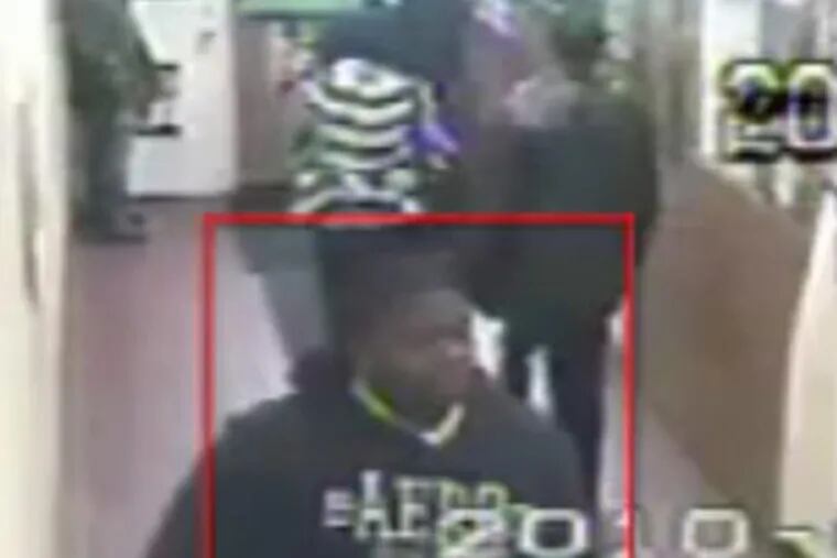 This man in the Aero sweatshirt is being sought by cops investigating the death of Eraina Merritt. This image is from a security video shot inside the Olney Steak and Beer Deli. Her beating and rape occurred behind the shop.