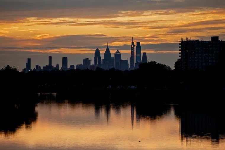 The Philadelphia skyline from the Cooper River in South Jersey in 2022. In spring and fall, lighted skyscrapers can attract — and injure — migrating birds.