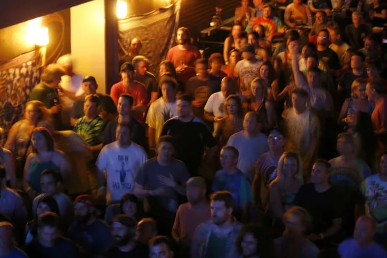 Crowds at Ardmore Music Hall watch a simulcast of the Grateful Dead's final "Fare Thee Well" show from Soldier Field, Chicago on July 3, 2015.