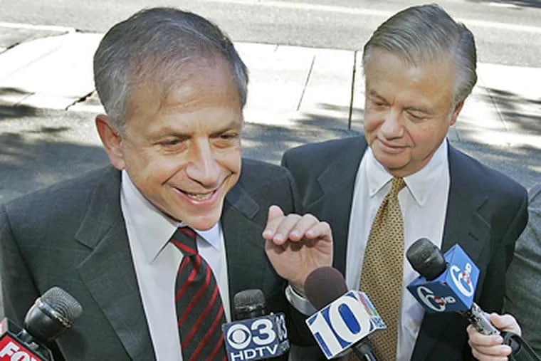 Defense attorney Dennis Cogan (left) informs reporters that he has instructed his client Vincent Fumo not to speak with the media. (Alejandro A. Alvarez / Staff Photographer / file)