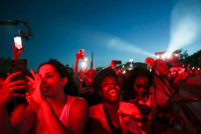 The crowd sings along as Jazmine Sullivan, a Philly native, performs at the Roots Picnic at the Mann Center in West Fairmount Park on Saturday, June 4, 2022. Crowded events may be less safe than they were before, due to the arrival of the BA.5 form of COVID-19, says Eddy Bresnitz.