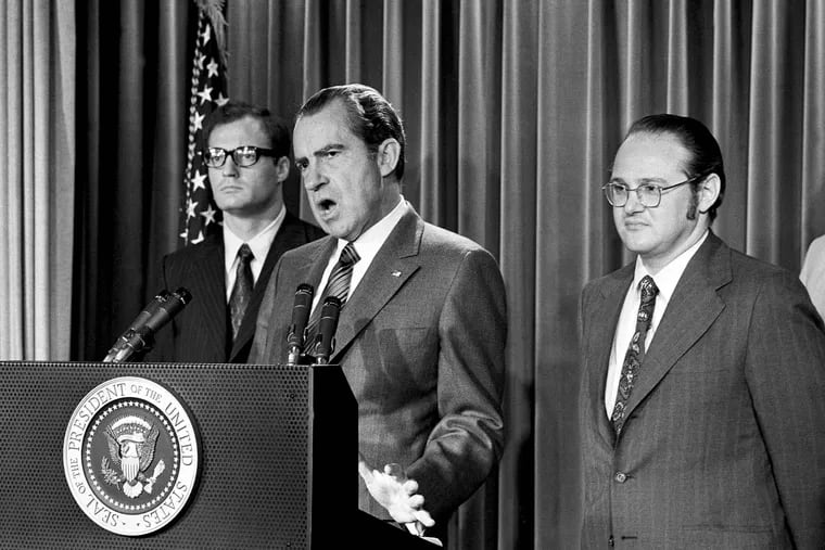 In this June 1971 file photo, President Richard Nixon (center) explains his request for an extra $155 million from Congress to combat the use of drugs, an issue he labeled "a national emergency."