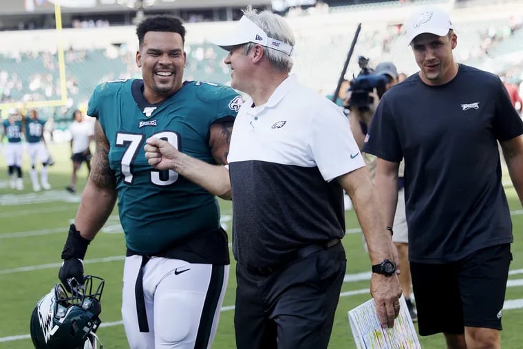 Eagles guard Brandon Brooks (79) talks with head coach Doug Pederson after a game against the Washington Redskins at Lincoln Financial Field in South Philadelphia on Sunday, Sept. 8, 2019. The Eagles won 32-27.