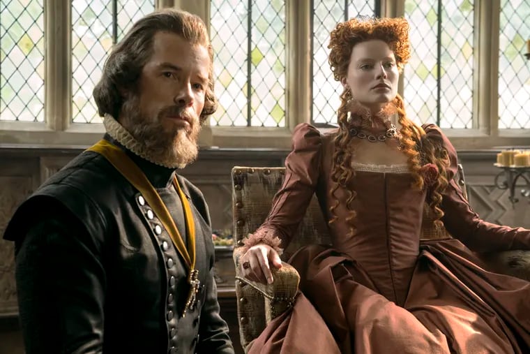 Guy Pearce and Margot Robbie in "Mary Queen of Scots."
